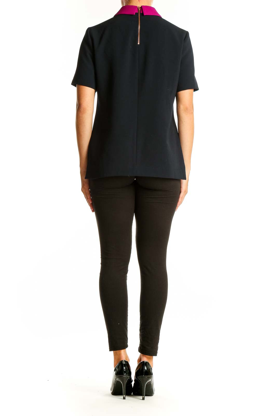 Back view of Ted Baker London black and white color-block top with short sleeves