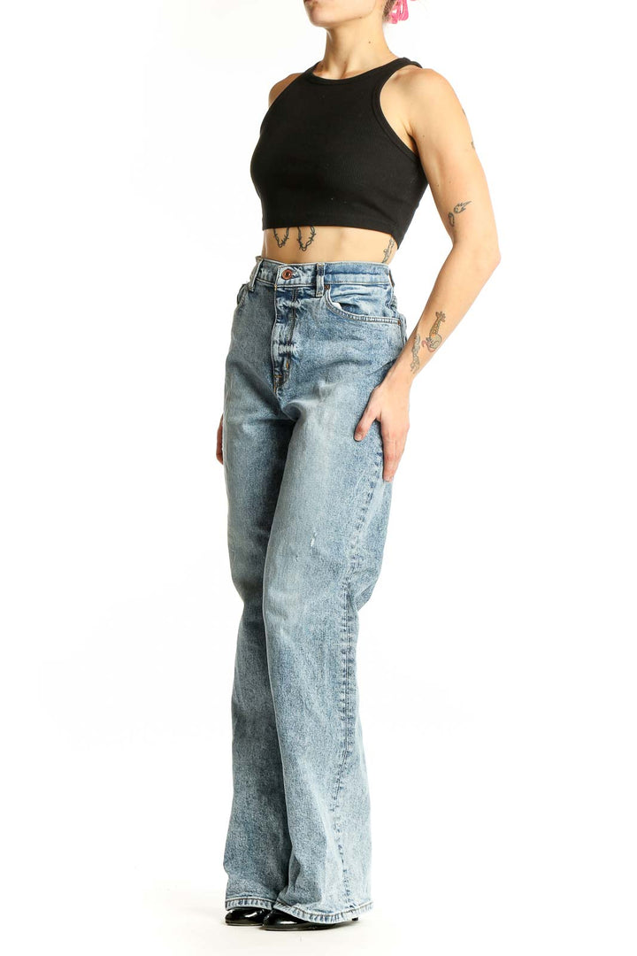Front view of C/E Current/Elliott light blue acid wash high-waisted wide-leg jeans