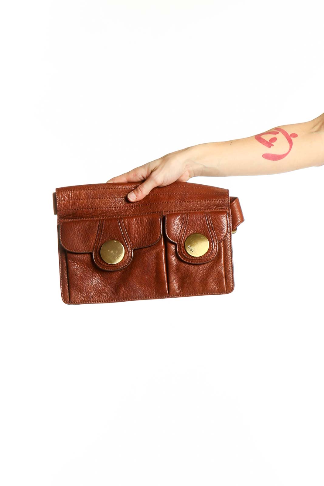 Front view of brown leather Shih belt bag with gold button accents