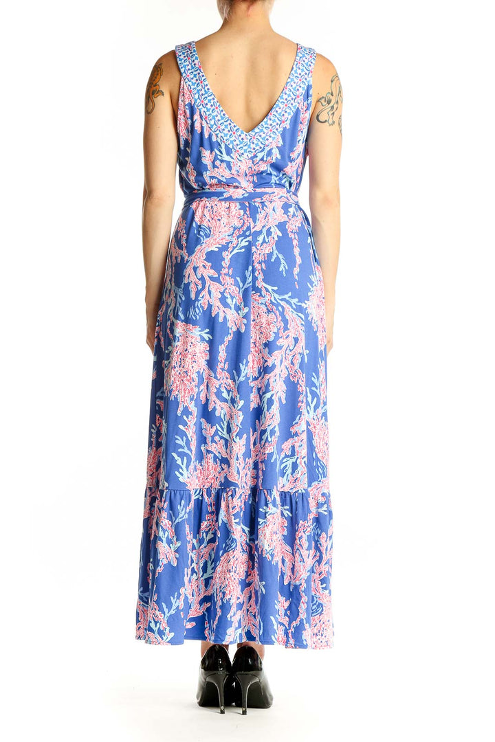 Side view of Lilly Pulitzer blue floral maxi dress showing full length and ruffle hem