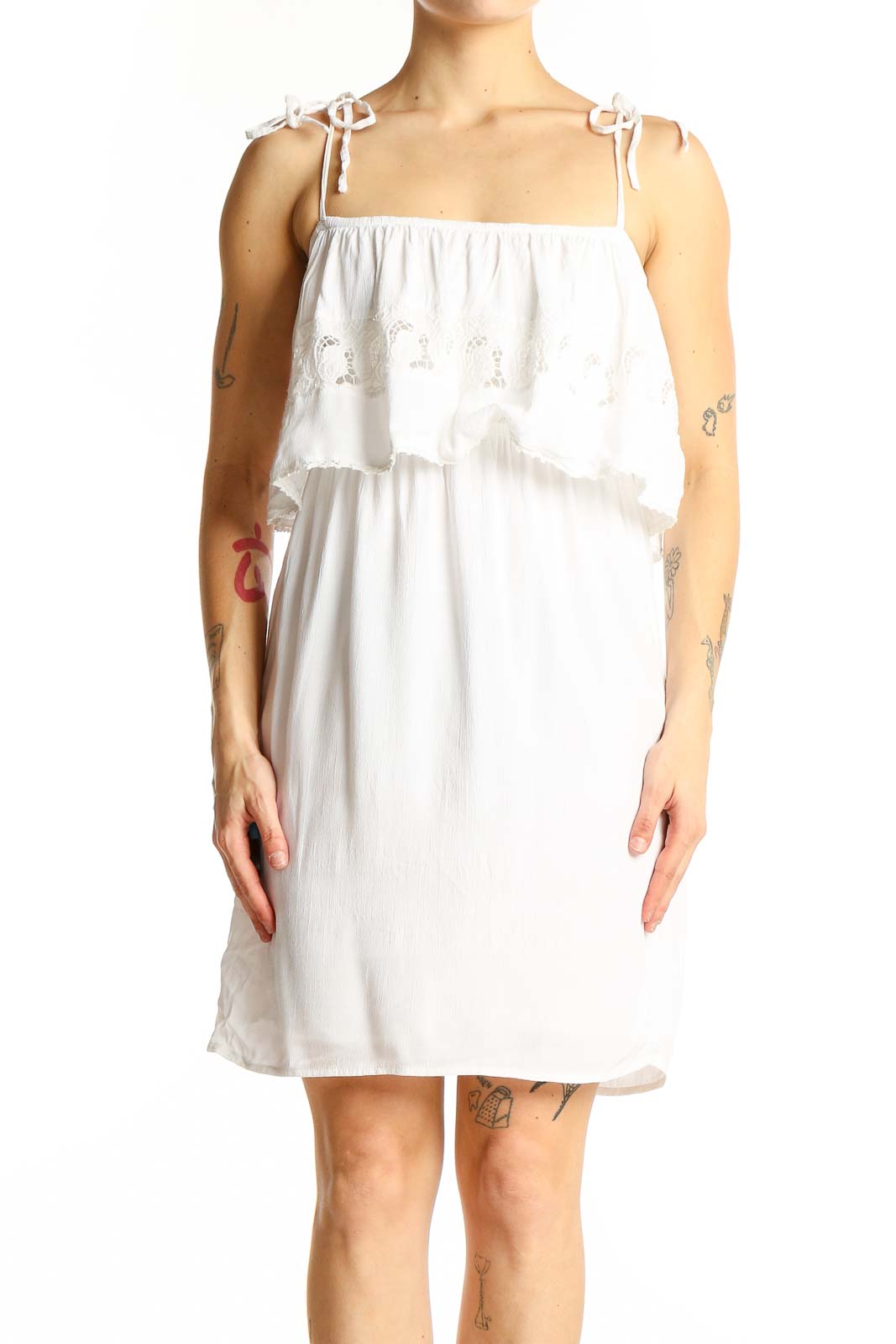 Front view of white cotton tiered ruffle sundress by L space