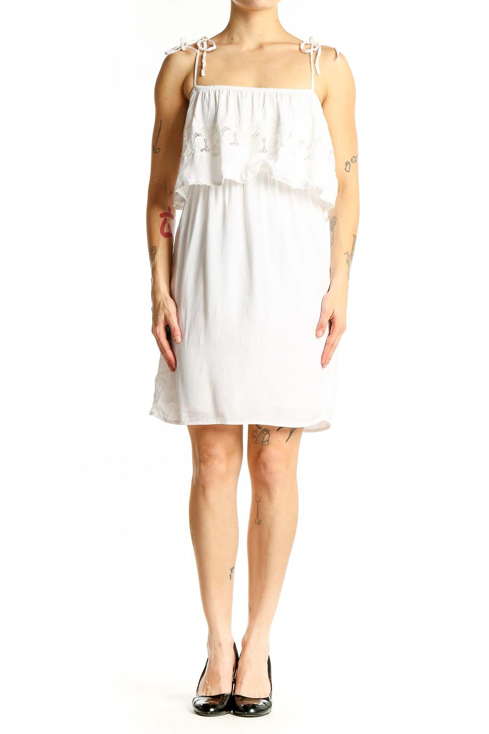 Front view of white cotton tiered ruffle sundress by L space