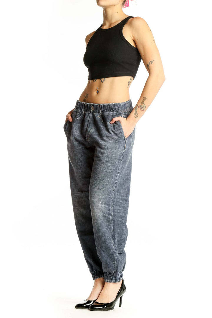 Front view of Rag & Bone blue denim jogger pants with elastic waistband