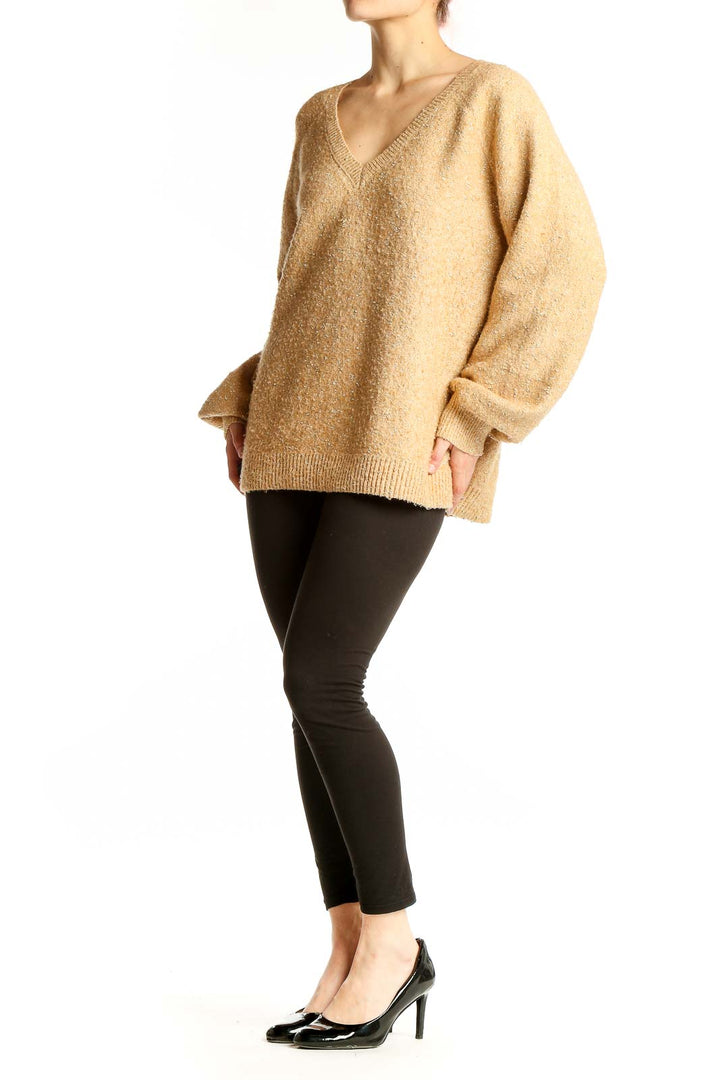 Front view of beige LOFT V-neck oversized knit sweater