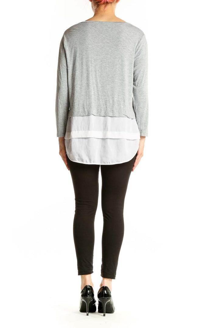 Side view of Michael Kors Gray Layered Long Sleeve Top showing layered design