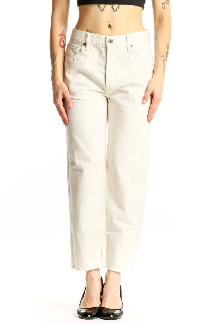 Front view of Vince cream cotton straight-leg jeans on model