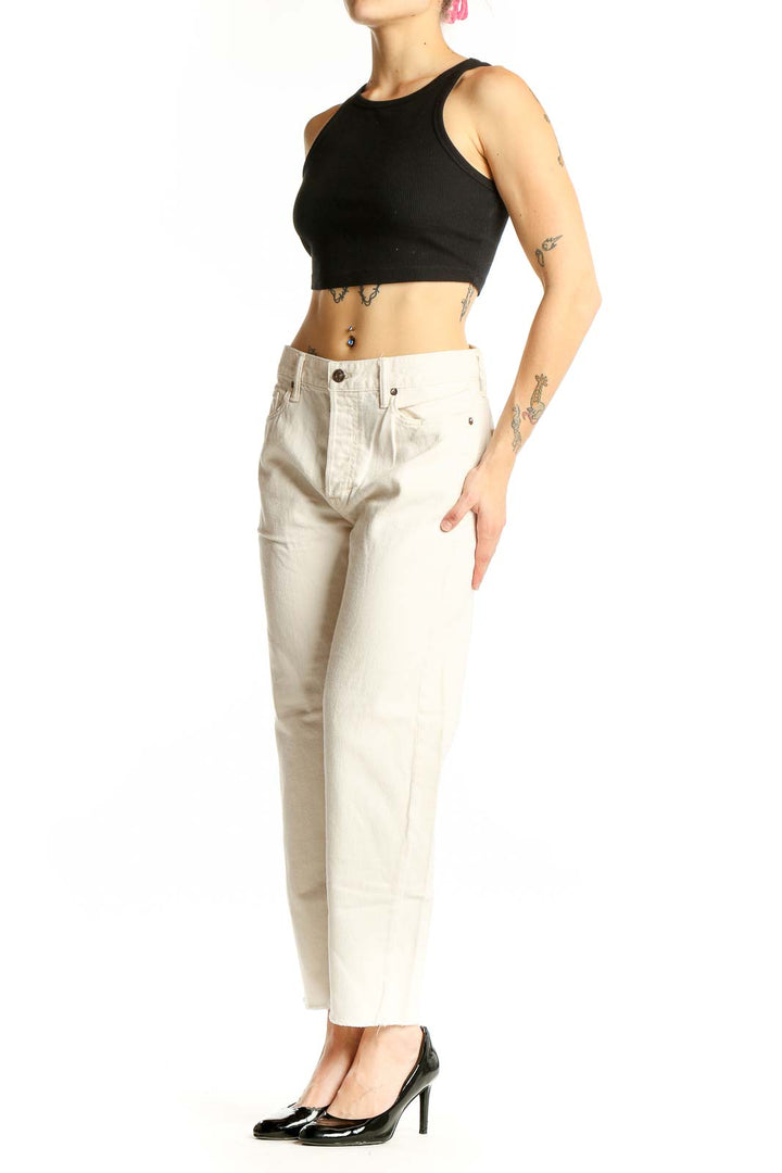 Front view of Vince cream cotton straight-leg jeans on model