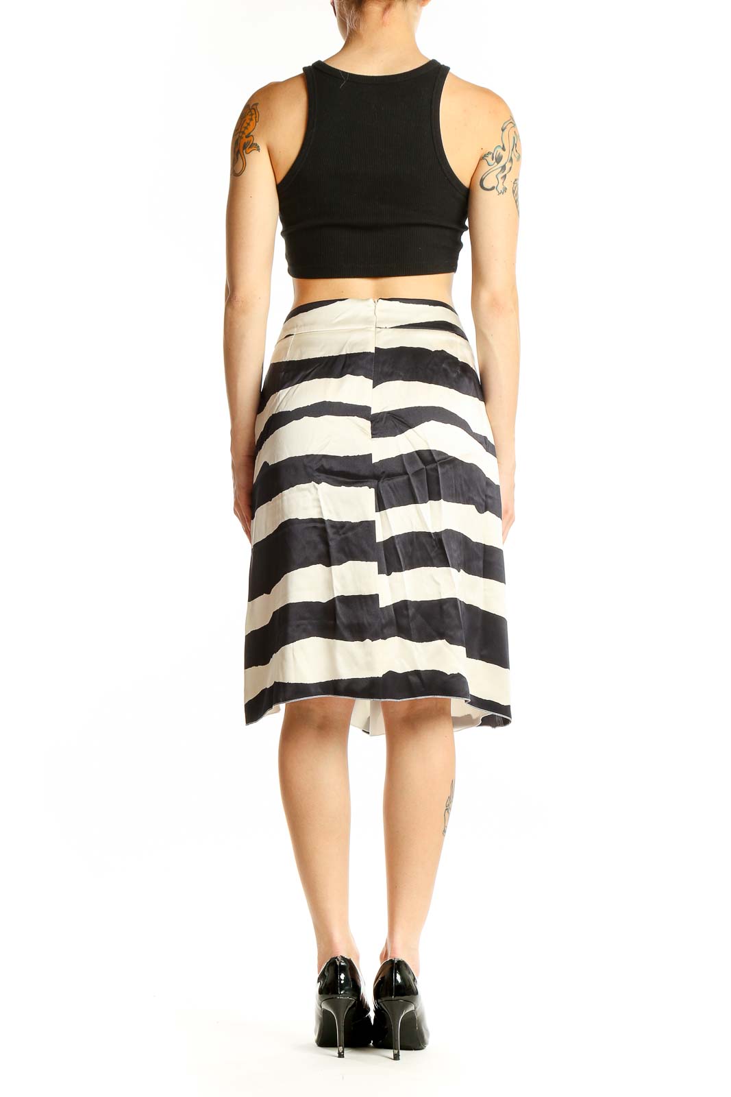 Side view of Armani Collezioni black and white zebra print silk wrap skirt on model