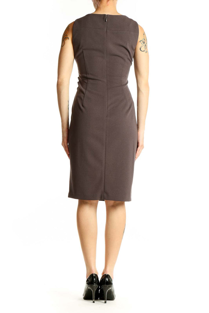 Back view of Calvin Klein brown sleeveless sheath dress showing fitted silhouette