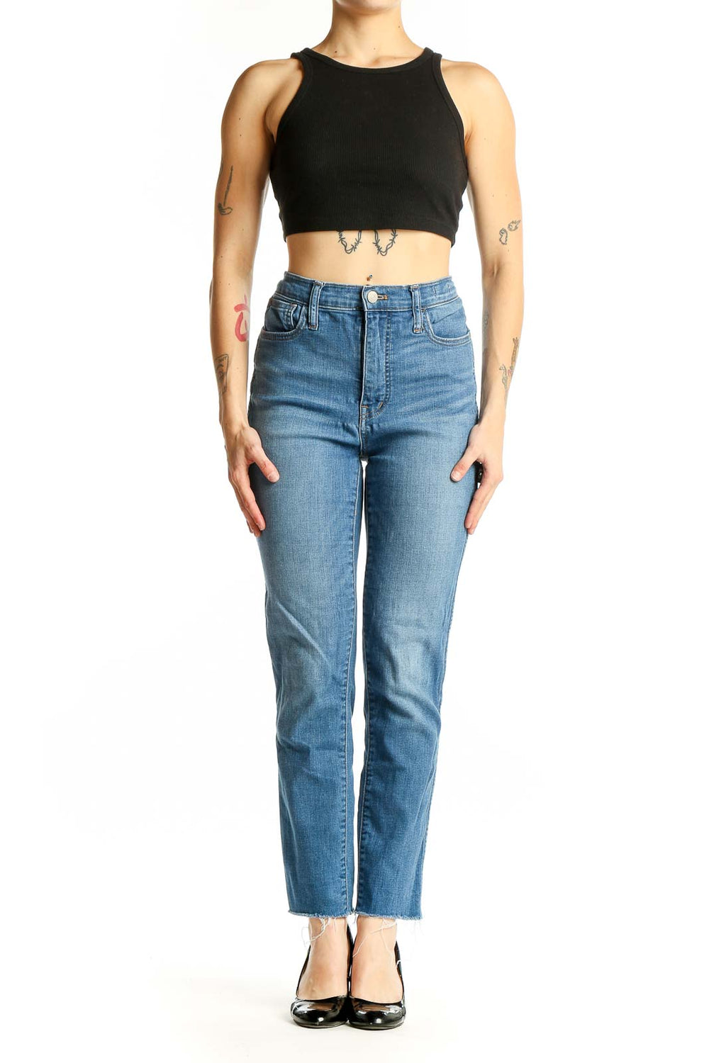 Front view of Madewell blue high-rise straight-leg jeans on model