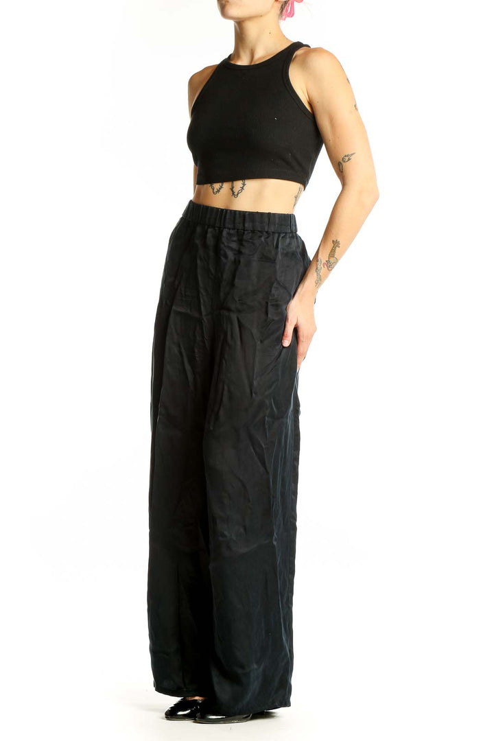 Front view of Eileen Fisher black Cupro wide-leg palazzo pants