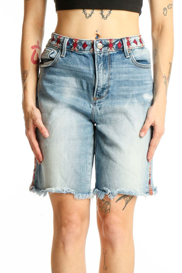 Front view of Driftwood light blue denim Bermuda shorts with embroidered waistband