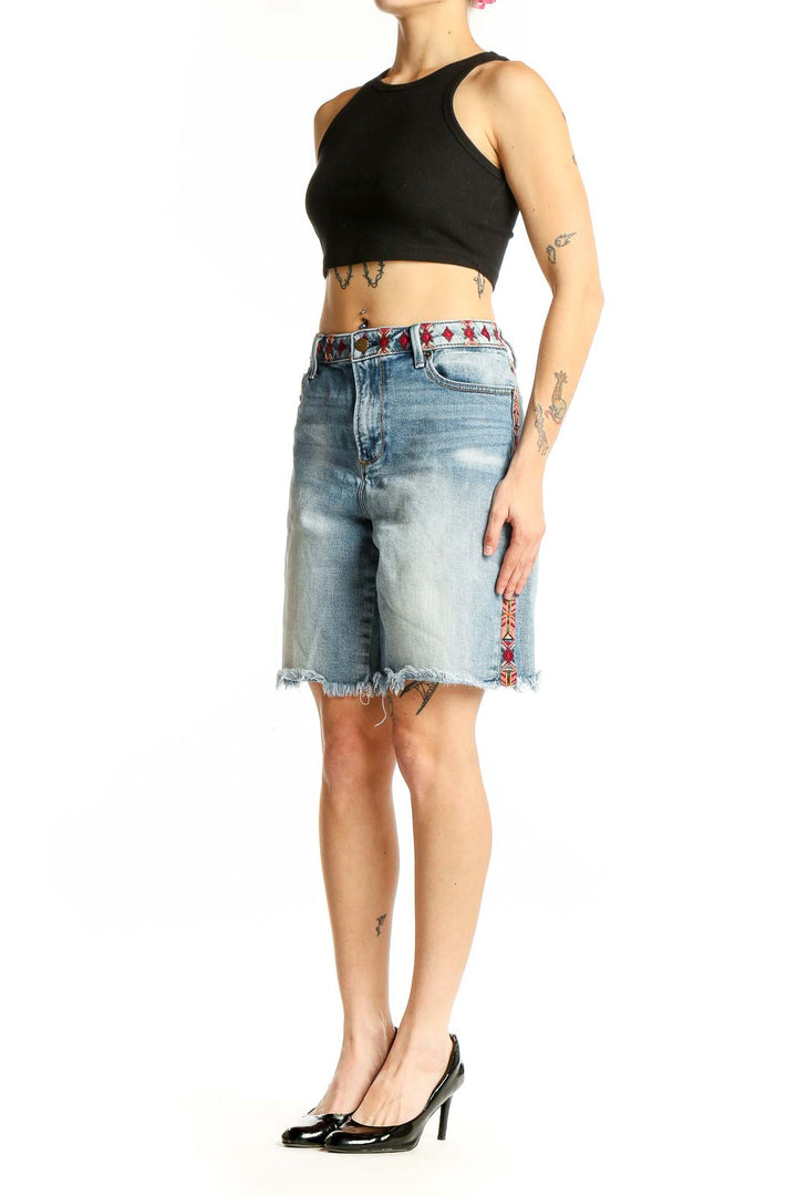 Front view of Driftwood light blue denim Bermuda shorts with embroidered waistband
