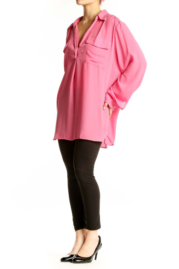 Front view of Ann Taylor pink polyester V-neck blouse with long sleeves