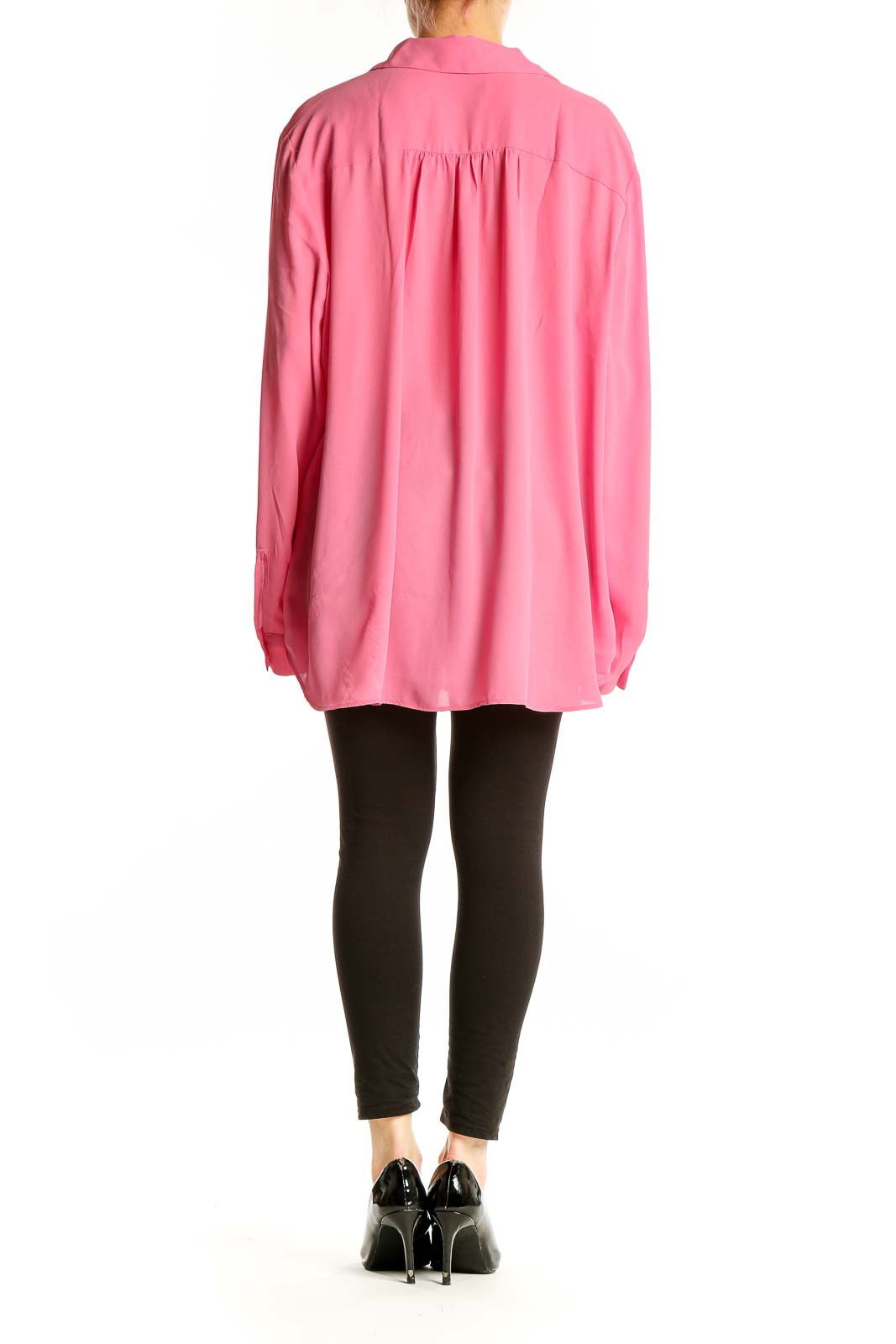 Side view of Ann Taylor pink polyester blouse showing relaxed fit