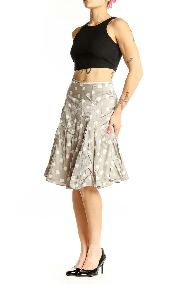 Front view of White House Black Market gray silk skirt with white polka dots