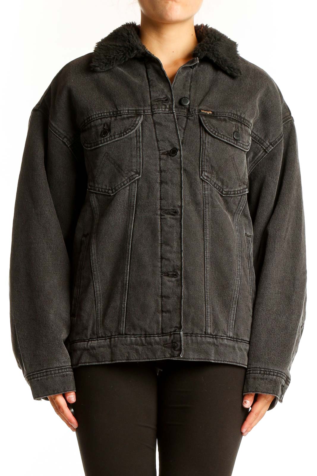 Front view of Wrangler black oversized denim jacket with faux fur collar