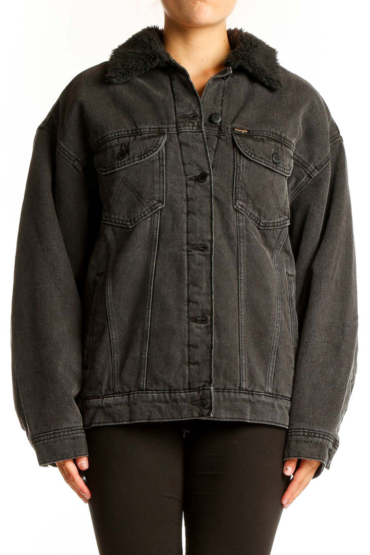 Front view of Wrangler black oversized denim jacket with faux fur collar