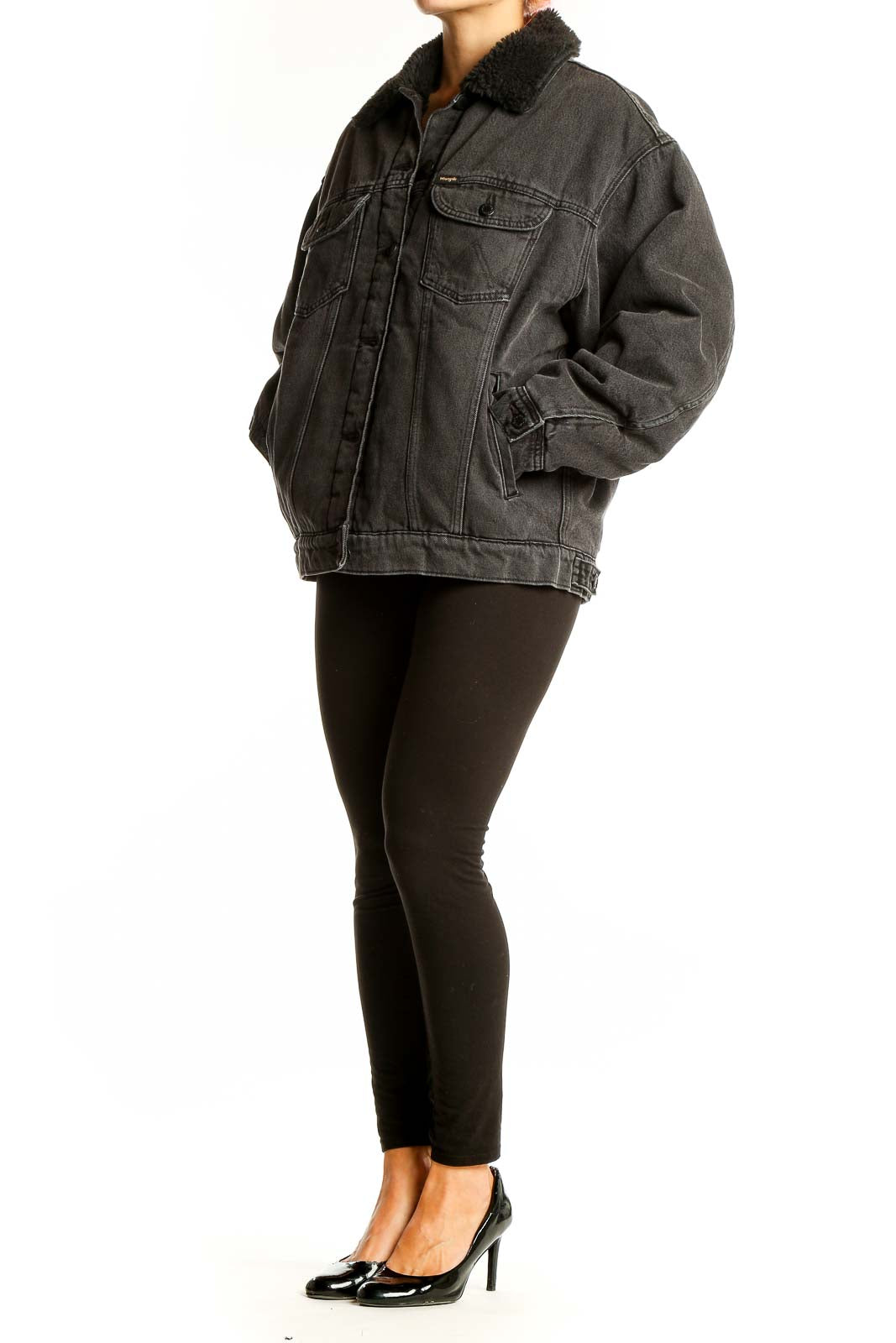 Front view of Wrangler black oversized denim jacket with faux fur collar