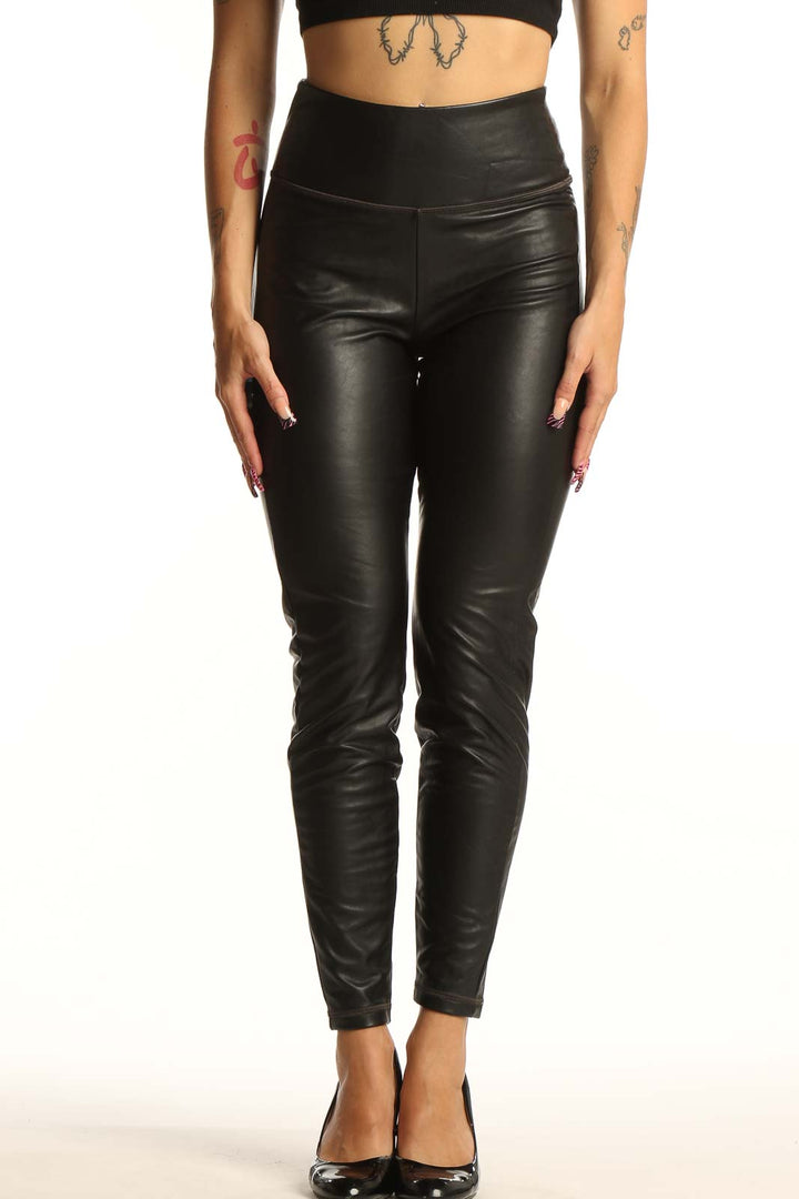 Front view of black faux leather high-waisted leggings from Athleta