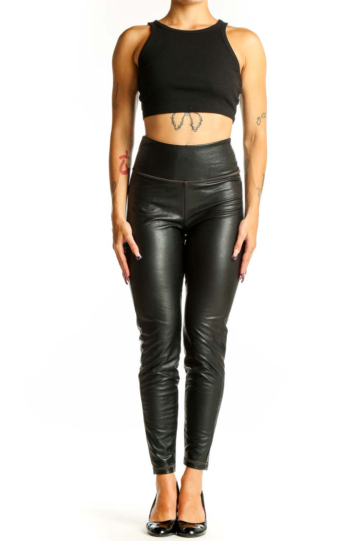 Front view of black faux leather high-waisted leggings from Athleta