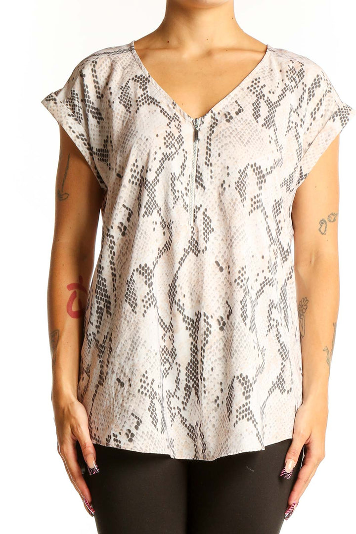 Front view of beige snake print V-neck blouse from Express