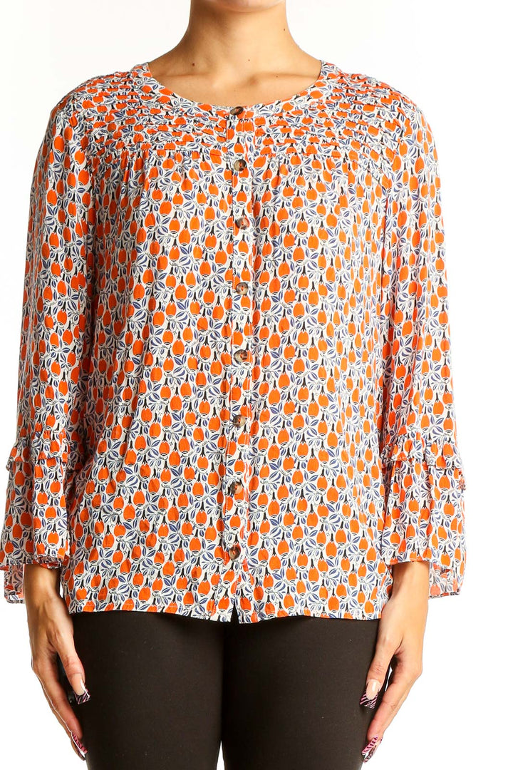 Front view of Maeve orange floral print rayon blouse with long sleeves