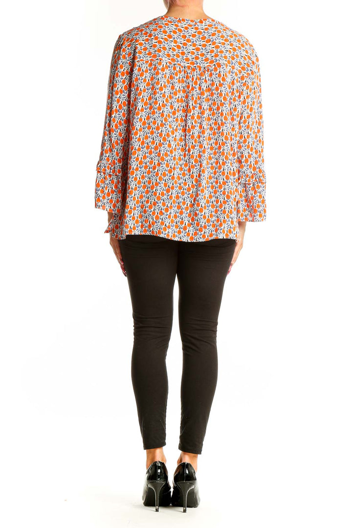 Back view of Maeve orange floral print rayon blouse showing relaxed fit