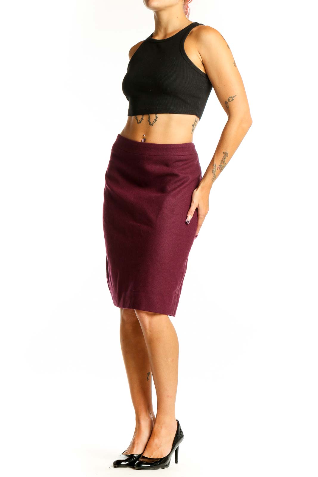 Front view of burgundy J.Crew pencil skirt on model