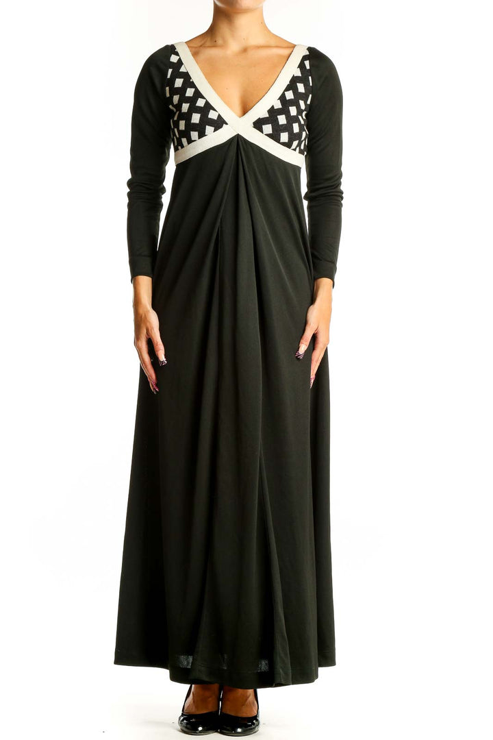 Front view of I.MAGNIN black maxi dress with geometric print bodice and white trim