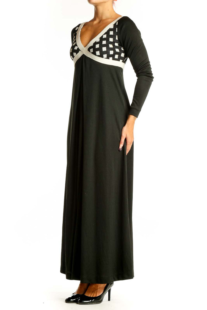 Front view of I.MAGNIN black maxi dress with geometric print bodice and white trim