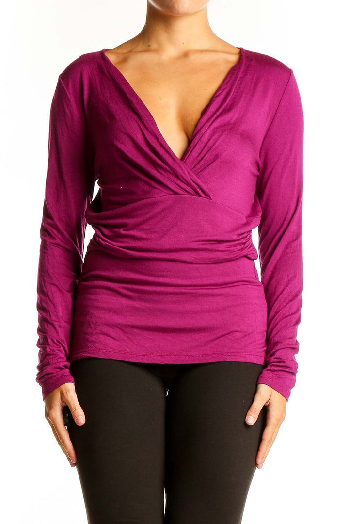 Front view of magenta Ann Taylor wrap-style top with V-neckline and ruched sides