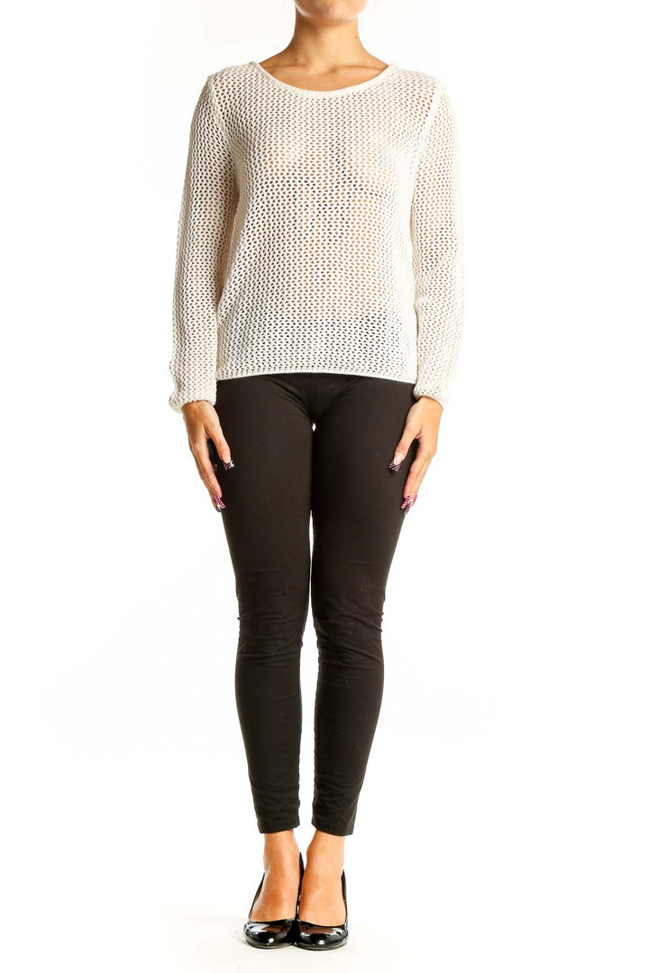 Front view of white open-knit Element sweater on model