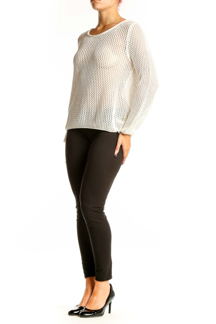 Front view of white open-knit Element sweater on model
