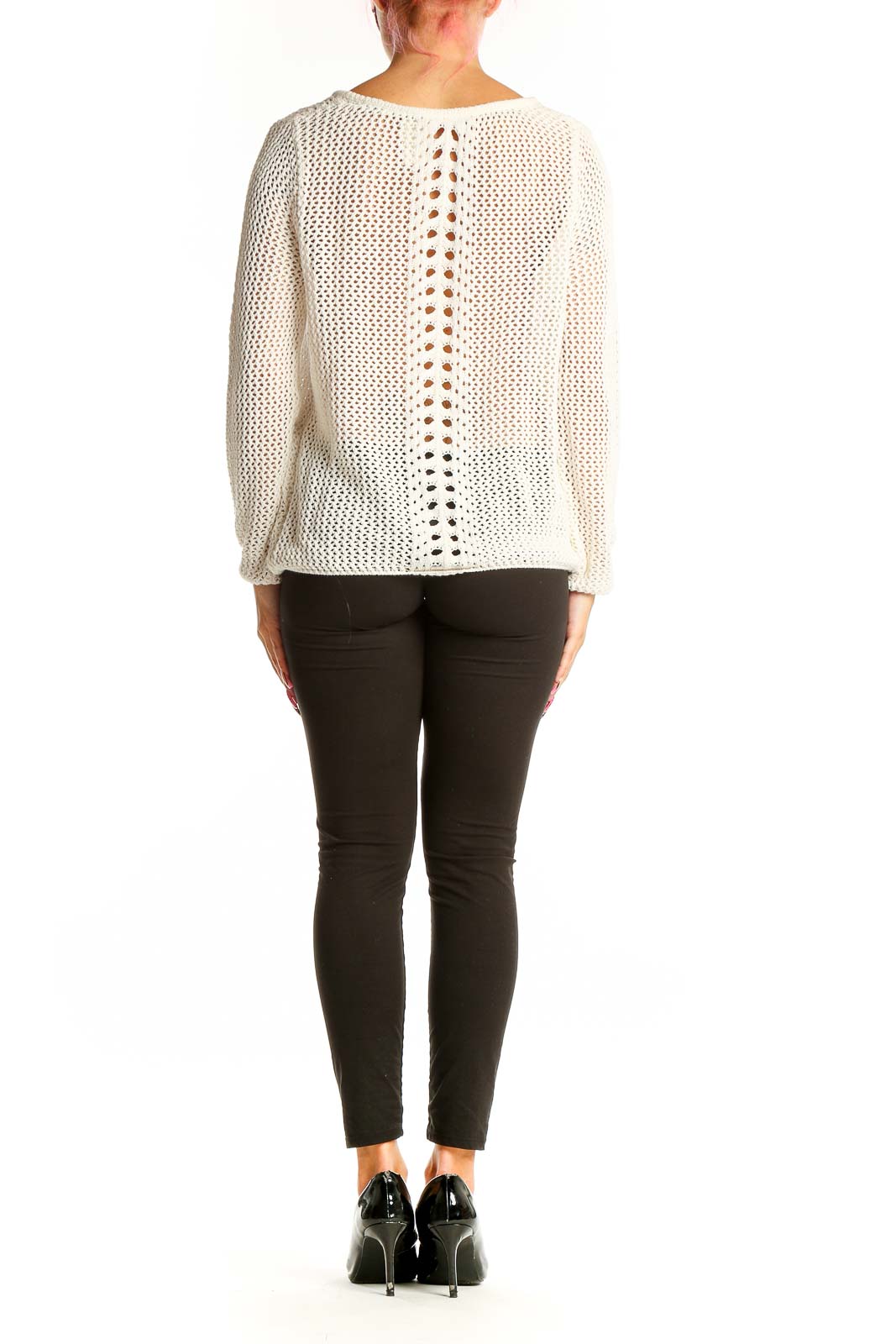 Side view of white open-knit Element sweater on model with black pants