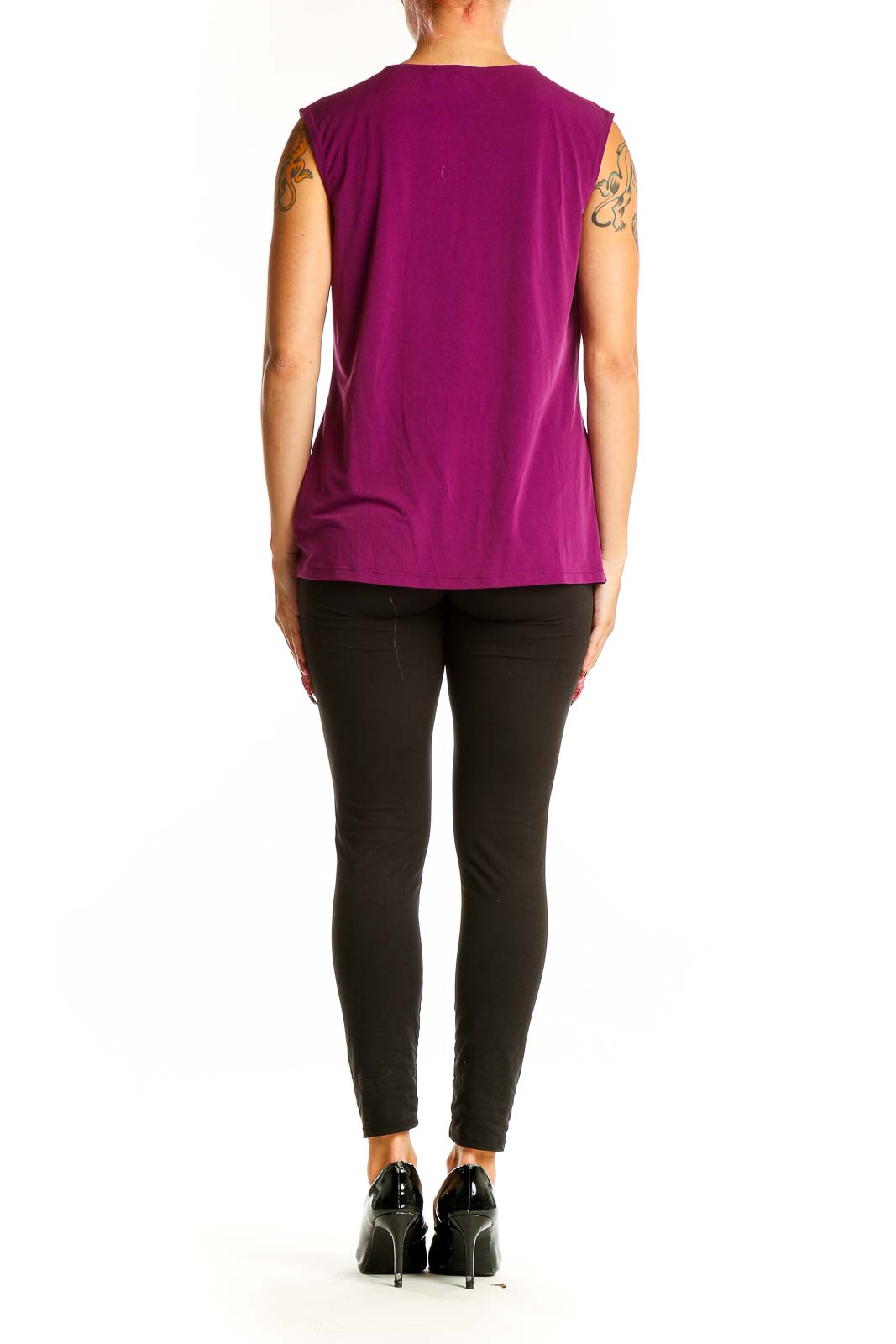 Side view of purple sleeveless blouse showing drape and fit
