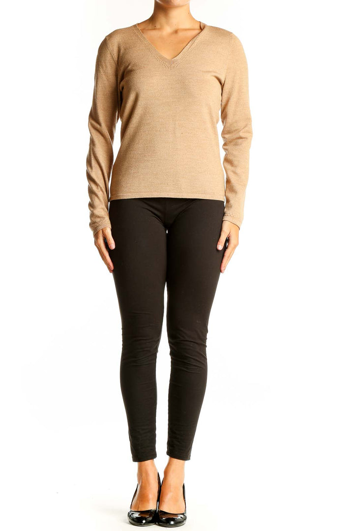 Front view of Ann Taylor beige V-neck long sleeve knit top