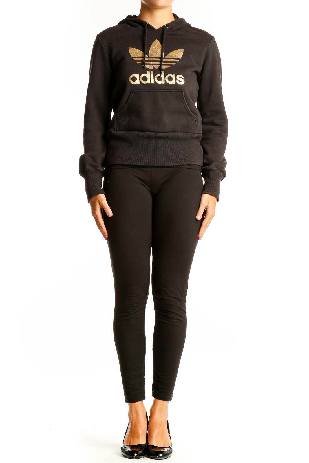 Front view of black Adidas hoodie with gold Trefoil logo