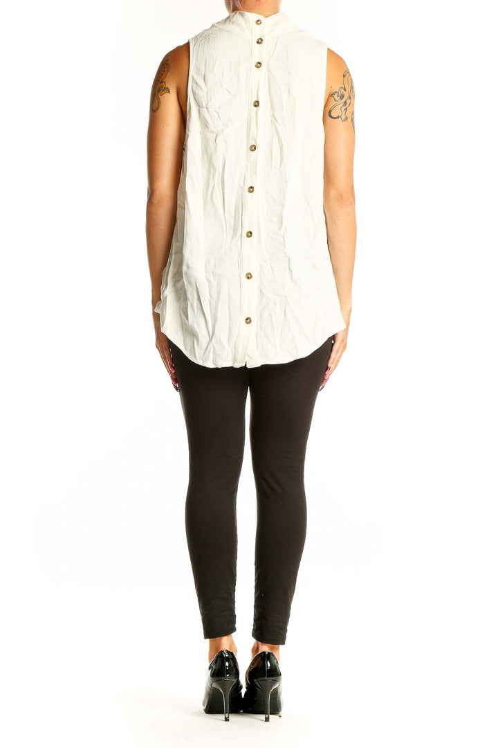 Side view of white sleeveless Maeve top showing relaxed fit