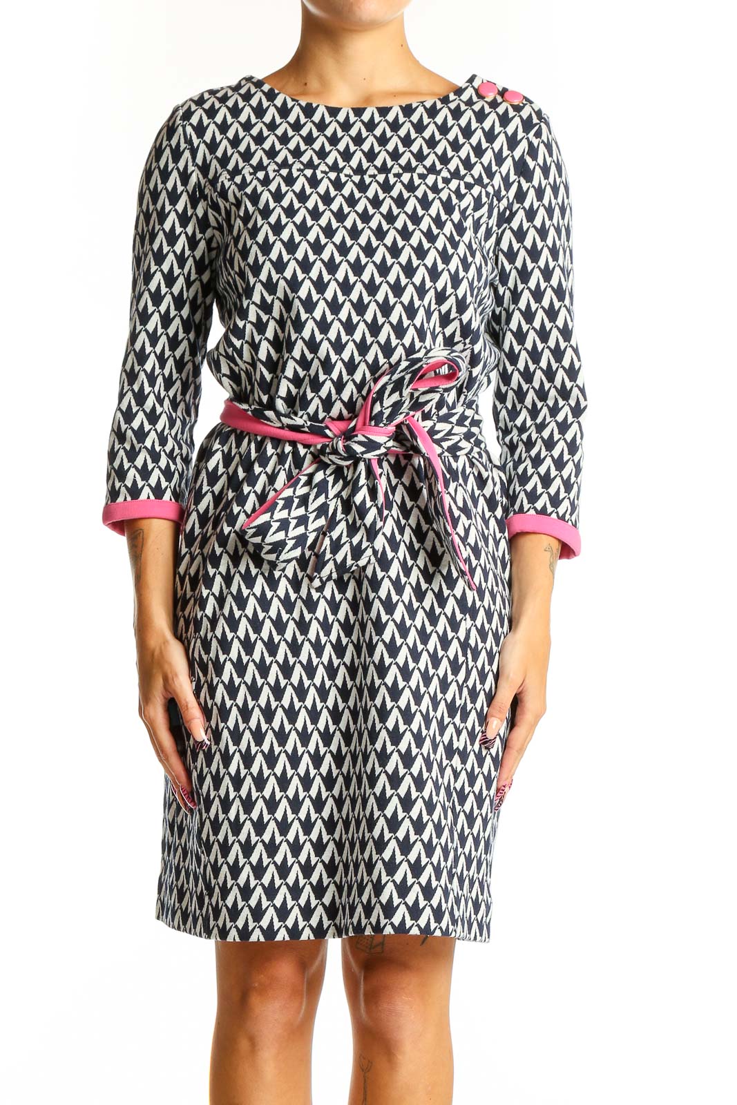 Front view of Lilly Pulitzer navy and white geometric print knit dress with pink belt