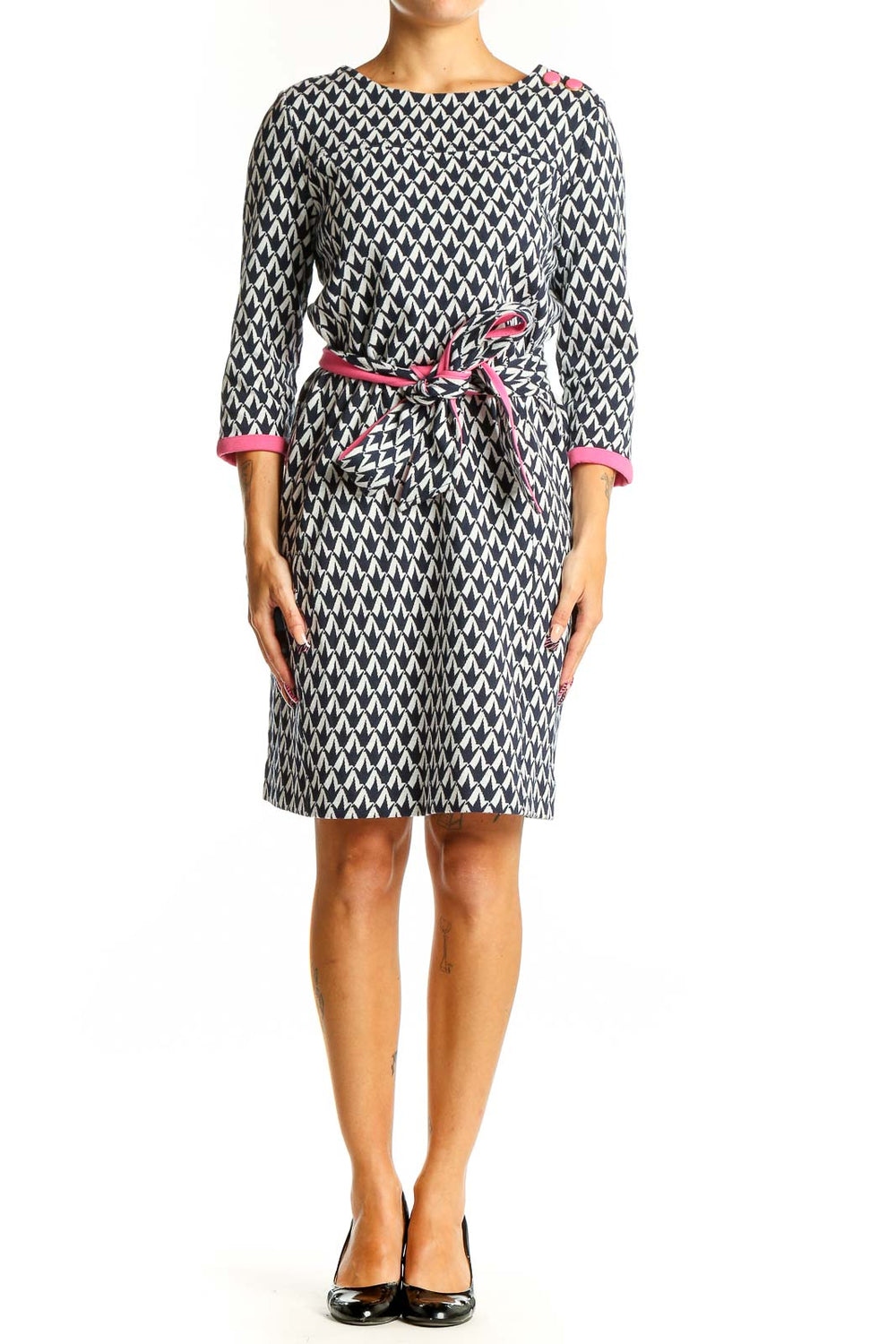 Front view of Lilly Pulitzer navy and white geometric print knit dress with pink belt