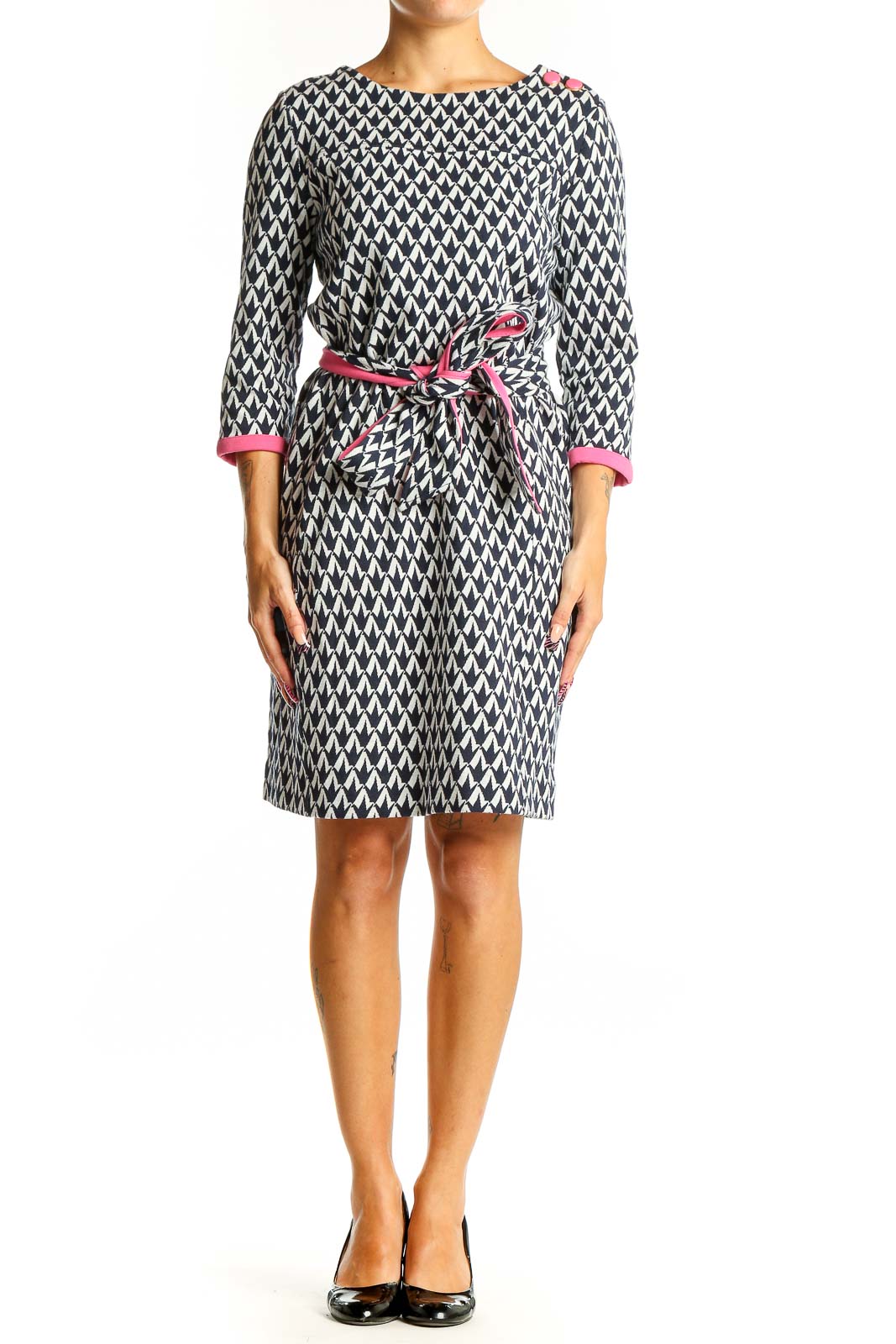 Front view of Lilly Pulitzer navy and white geometric print knit dress with pink belt