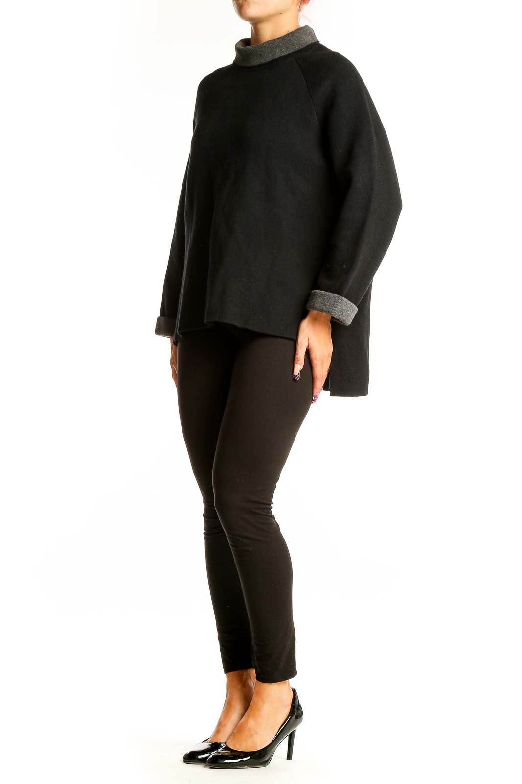 Front view of Reiss black cashmere blend turtleneck sweater with grey accents