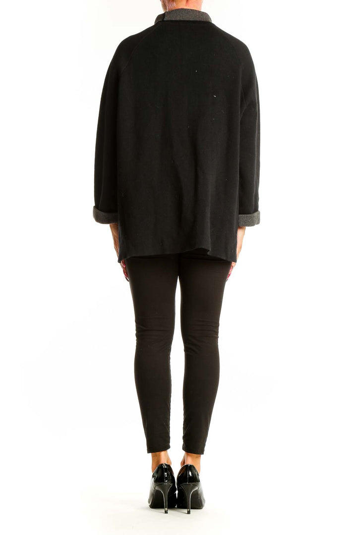 Back view of Reiss black cashmere blend turtleneck sweater showing relaxed fit