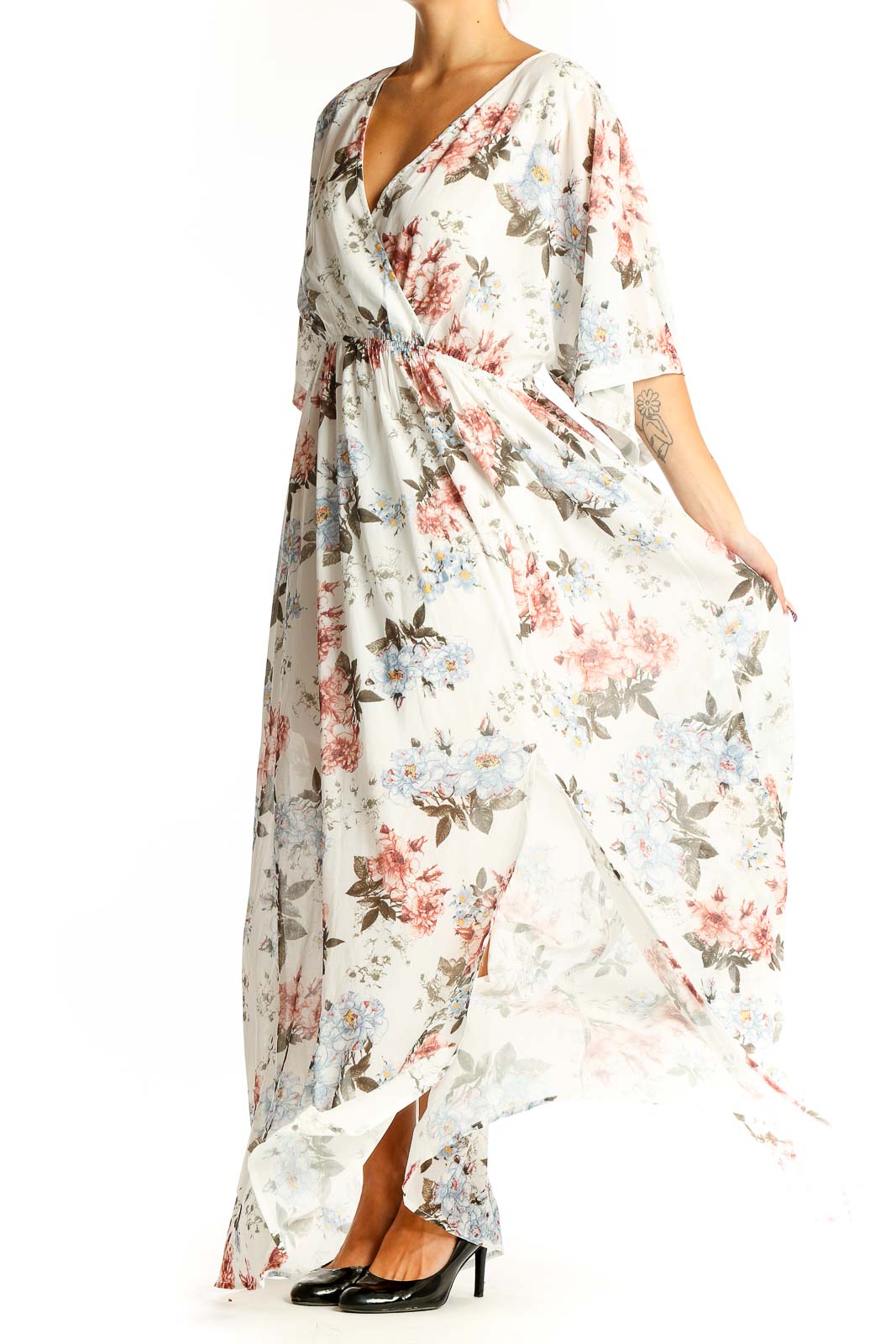 Front view of white floral maxi wrap dress with pink and blue flowers