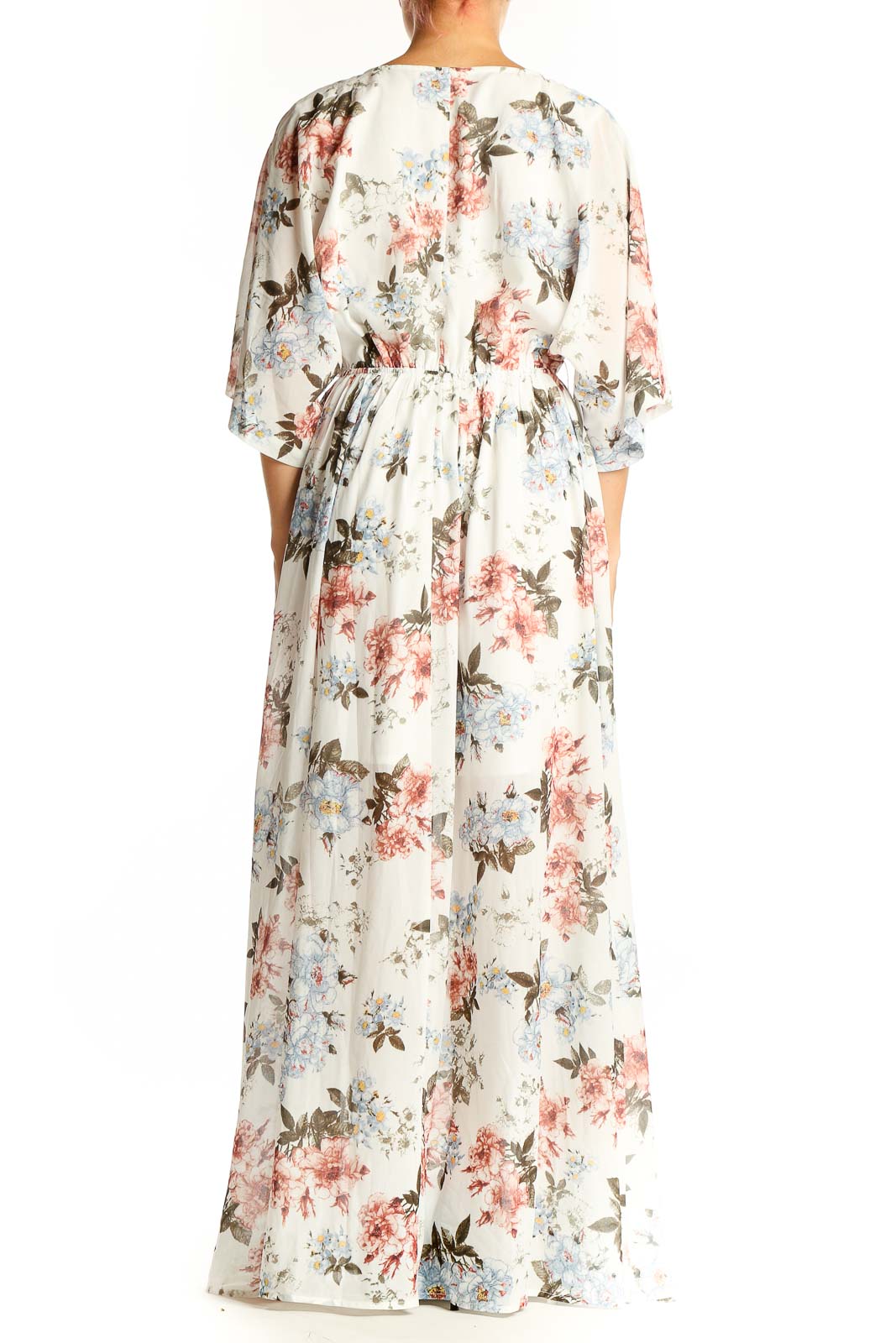 Back view of white floral maxi wrap dress showing full length and flowy design
