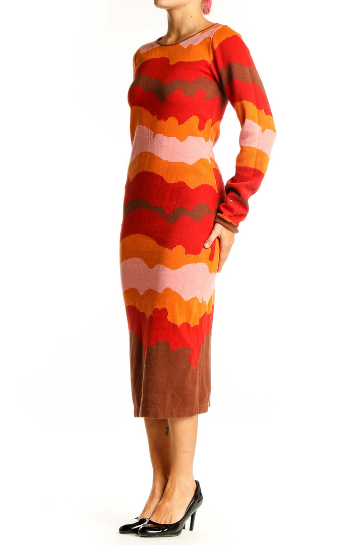 Front view of Another Girl Orange Wavy Striped Knit Midi Dress with vibrant sunset pattern