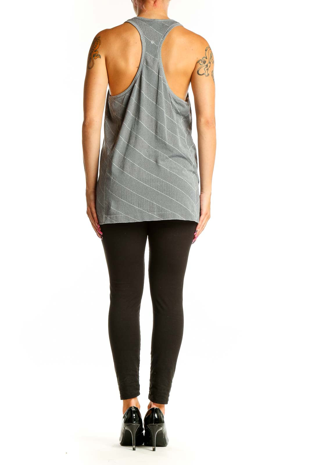 Side view of gray striped Lululemon racerback tank top on model