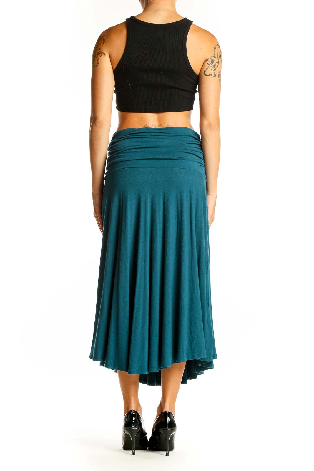 Side view of teal Tommy Bahama midi skirt showing flowing A-line cut