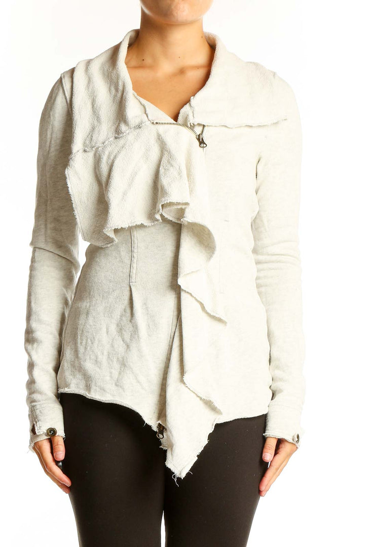 Front view of white ruffled cotton zip-up jacket from WE THE FREE